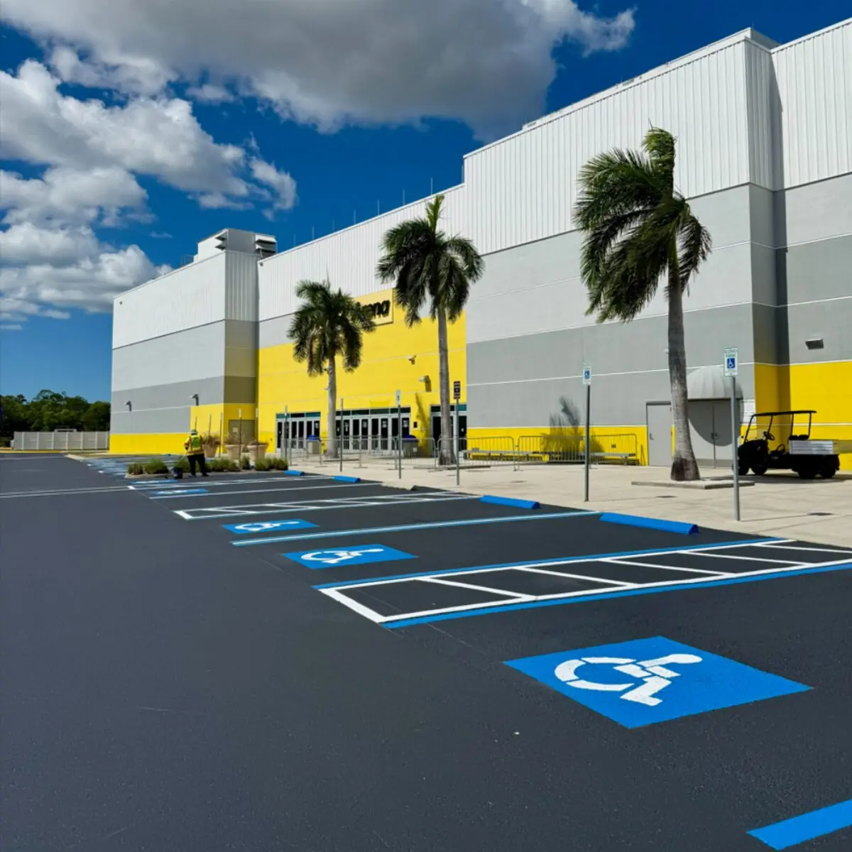 Freshly striped parking lot with ADA accessible stalls at Hertz Arena in Southwest Florida